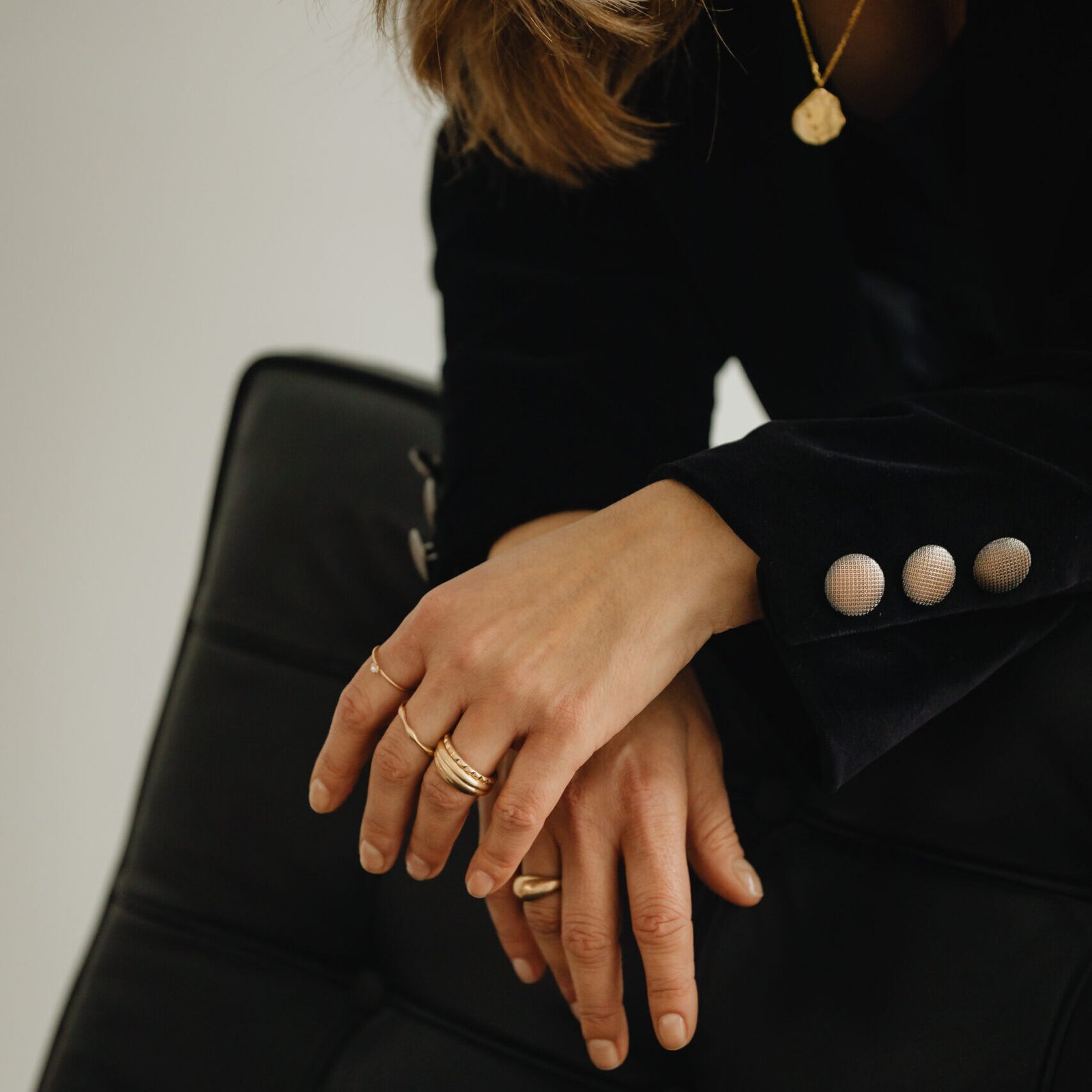 kaboompics jewelry photo shoot woman wearing gold rings and necklace 29228