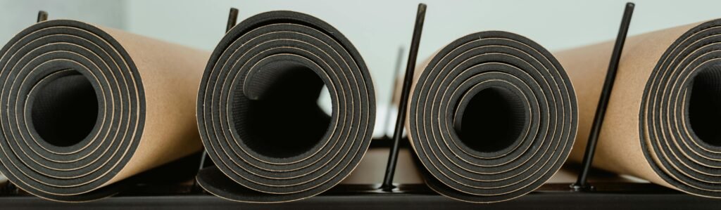 Pilates mats arranged in a home workout area